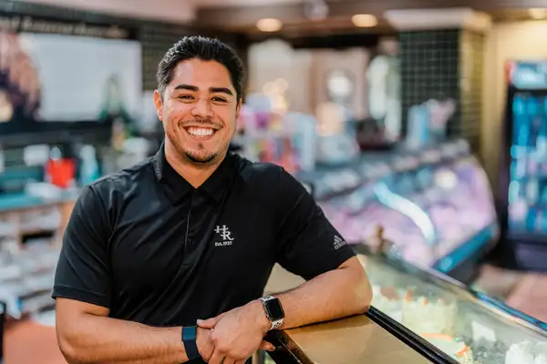 Employee smiling in shop
