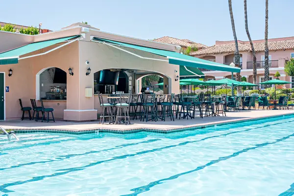 Harris Ranch pool and outdoor bar with seating