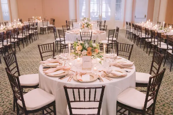 Reception tables with floral centerpieces in the Garden Ballroom